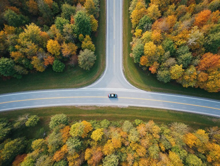Car on a highway through upstate New York hills